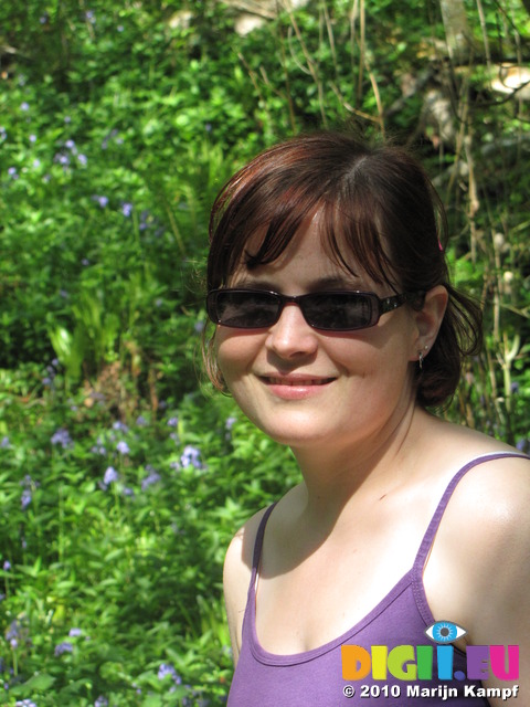 SX14153 Jenni with Bluebells (Scilla non-scripta) in background